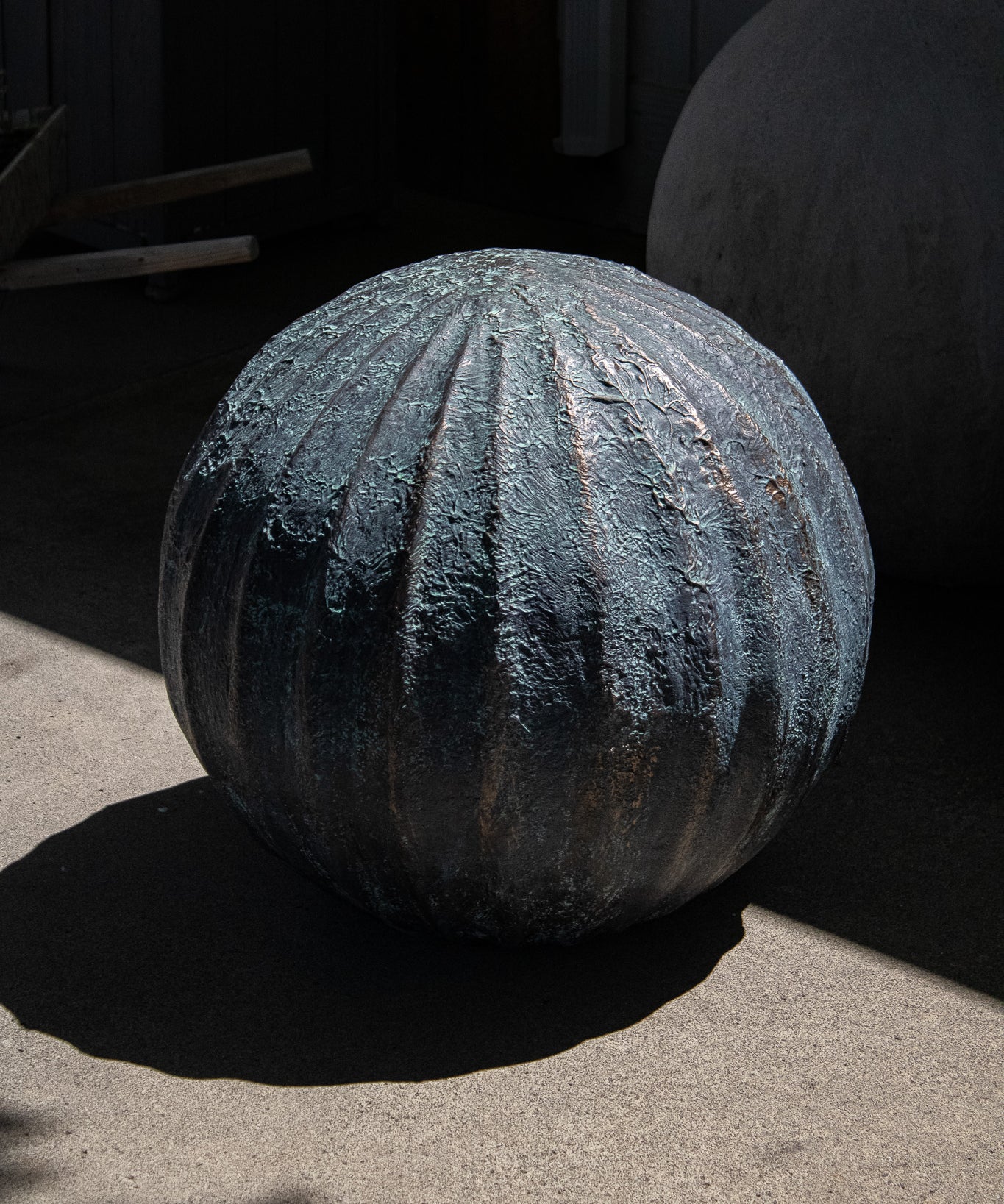 Oversized Ribbed Concrete Orb Sculpture, Green Oxidized Bronze