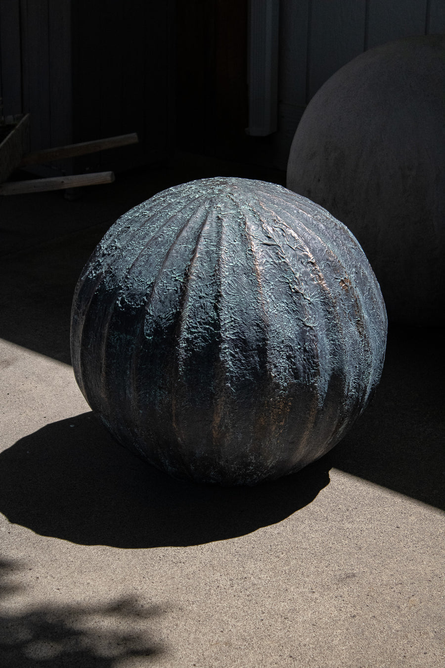 Large Ribbed Concrete Orb Sculpture, Green Oxidized Bronze
