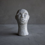Carved Concrete Man Sculpture