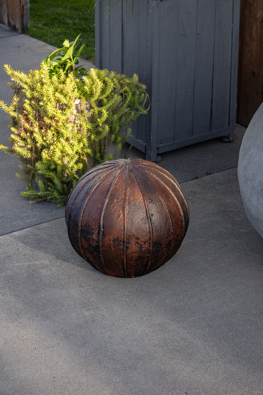 Ribbed Concrete Orb Sculpture, Brown Patina Color
