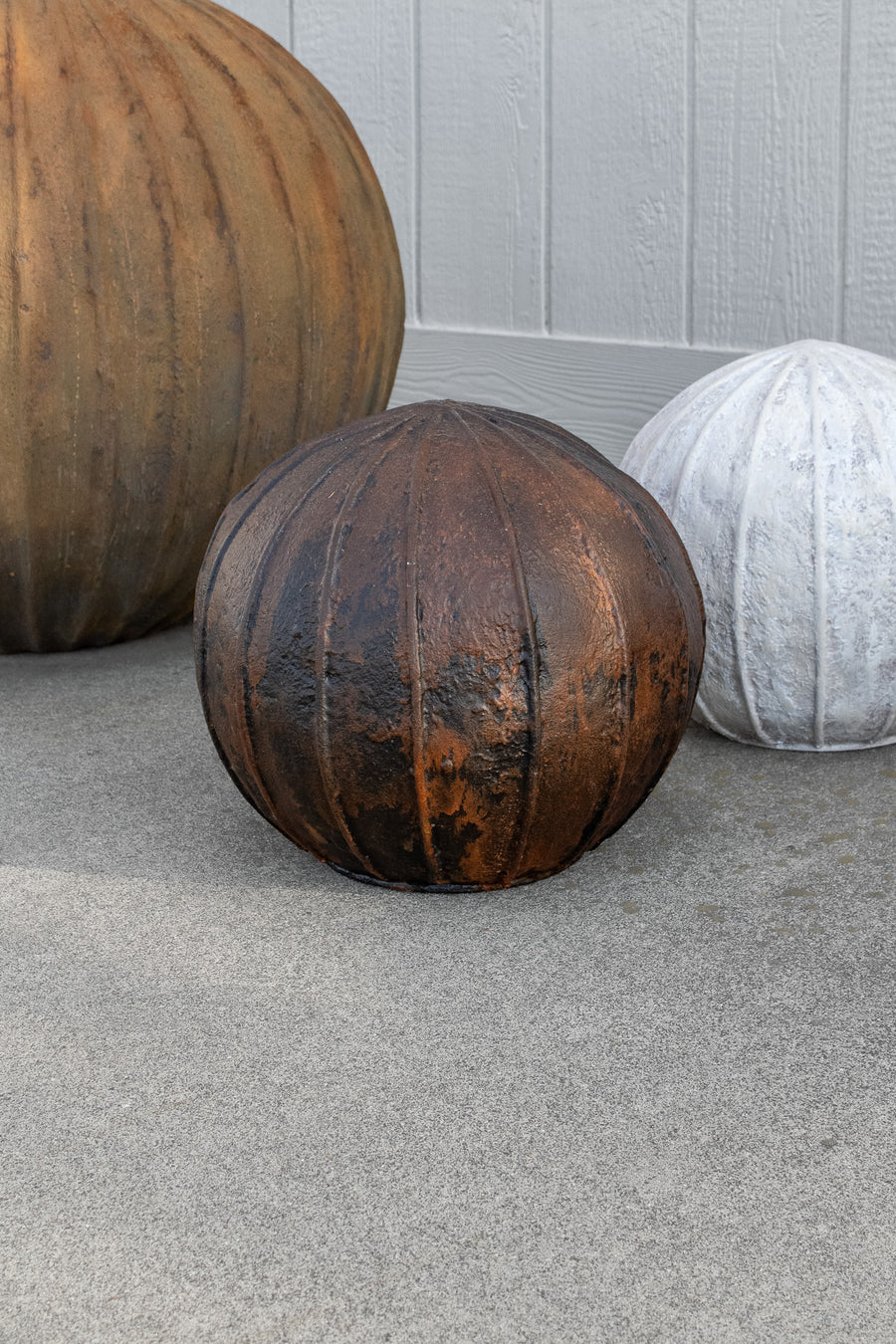 Ribbed Concrete Orb Sculpture, Brown Patina Color