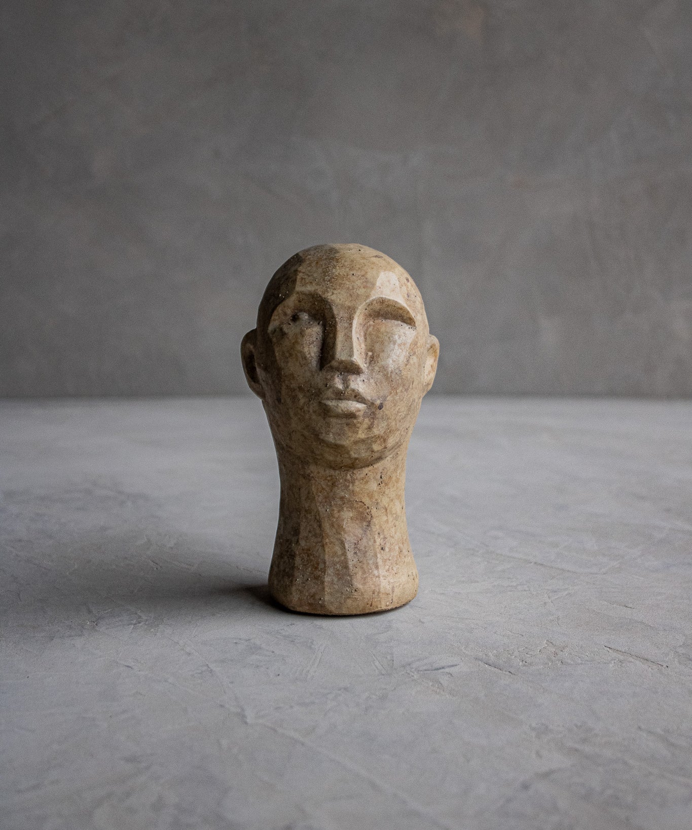 Carved Concrete Man Sculpture